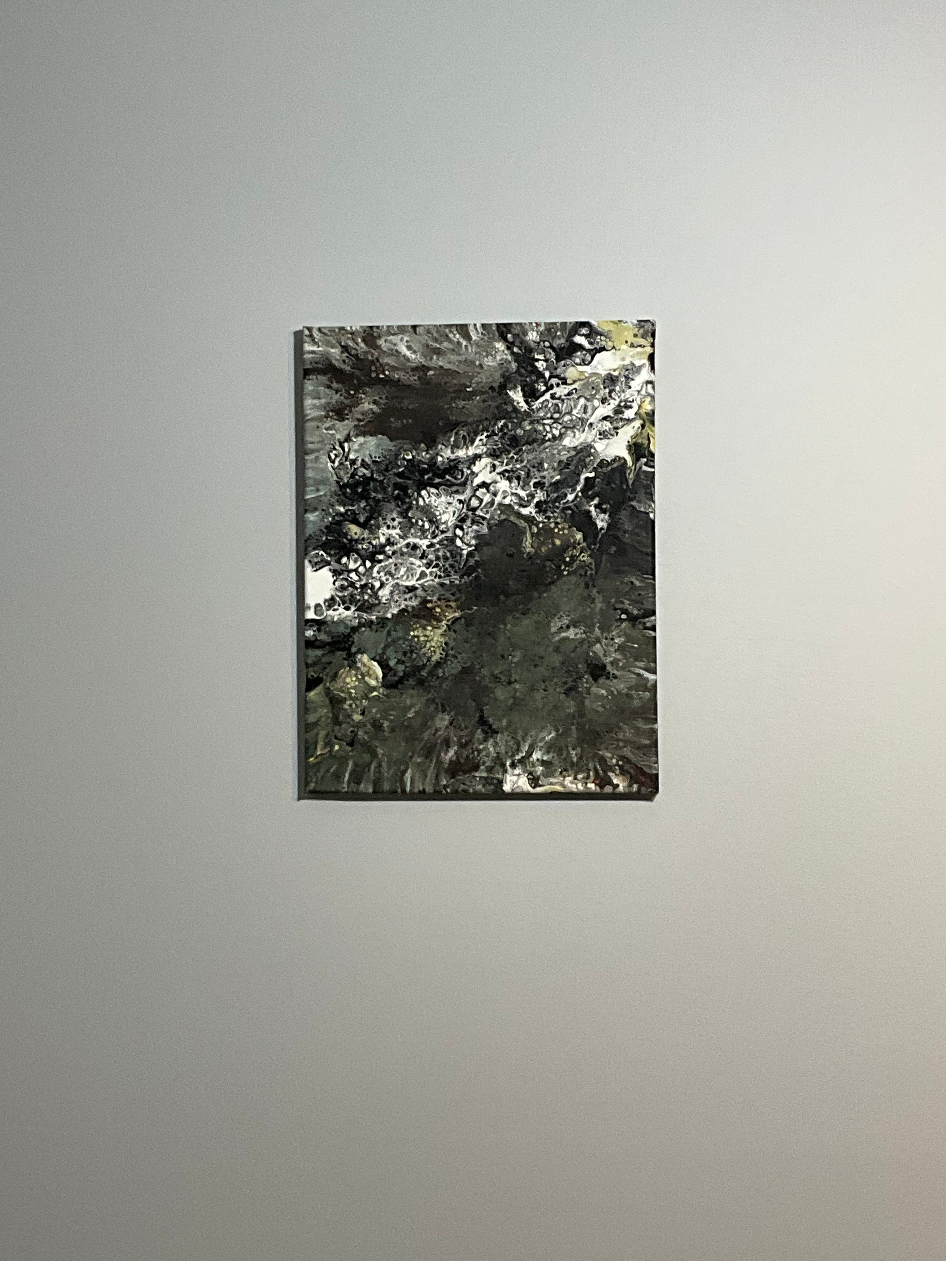Abstract art piece on a gray wall